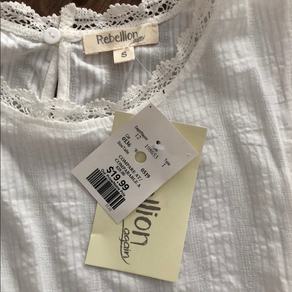 Size small woman’s peplum top. - Picture 2 of 4